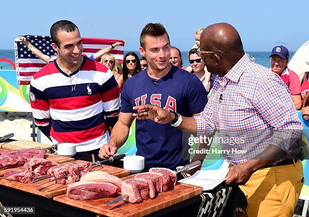 Gymnasts, Danell Leyba and Sam Mikulak of the United States discuss steaks with Al Roker the Today show set on Copacabana Beach on August 19, 2016 in...