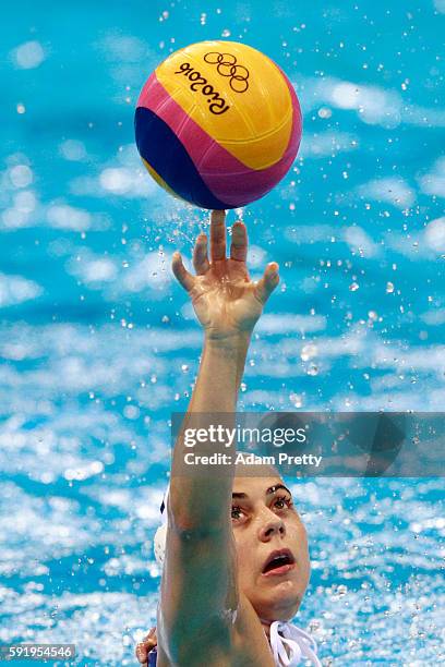 Mariana Duarte of Brazil balances the ball during the Women's Water Polo 7th - 8th Classification match between Brazil and China on Day 14 of the Rio...