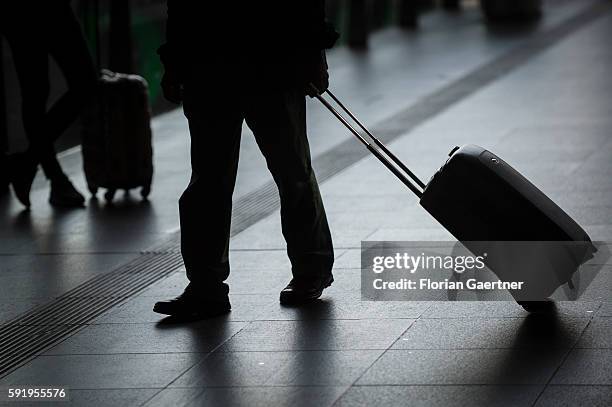 The silhouette of a suitcase is captured at the central station on August 19, 2016 in Berlin, Germany.