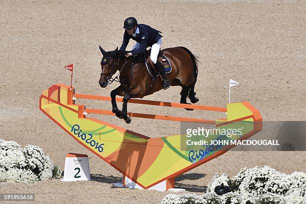 Sweden's Peder Fredricson on his horse All In competes in the final round of the individual equestrian show jumping event at the Olympic Equestrian...