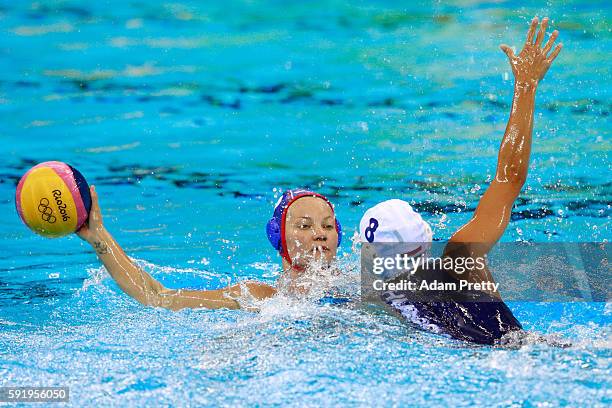 Evgeniya Ivanova of Russia is challenged by Rita Keszthelyi of Hungary during the Women's Water Polo Bronze Medal match between Hungary and Russia on...