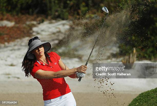 Maria Verchenova of Russia plays a bunker shot on the fourth hole during the third round of the Women's Individual Stroke Play golf on Day 14 of the...