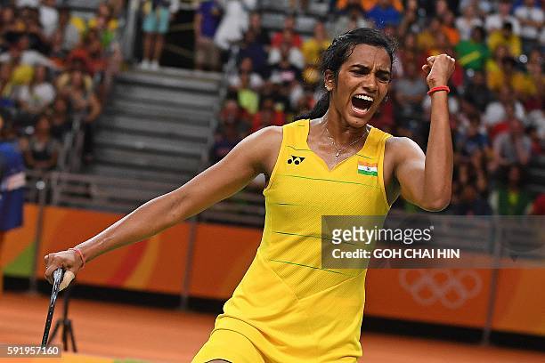 India's Pusarla V. Sindhu reacts against Spain's Carolina Marin during their women's singles Gold Medal badminton match at the Riocentro stadium in...