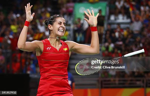 Carolina Marin of Spain celebrates match point against V. Sindhu Pusarla of India during the Women's Singles Gold Medal Match on Day 14 of the Rio...