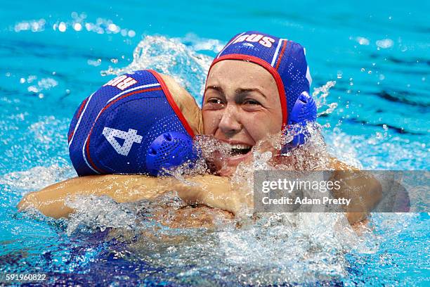 Elvina Karimova of Russia and Ekaterina Lisunova of Russia celebrate winning the bronze during the Women's Water Polo Bronze Medal match between...