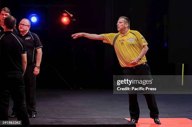 James Wade plays a shot in his match against Harley Kemp during the first round of the Ladbrokes Sydney Darts Masters. Dave Chisnall won his match...