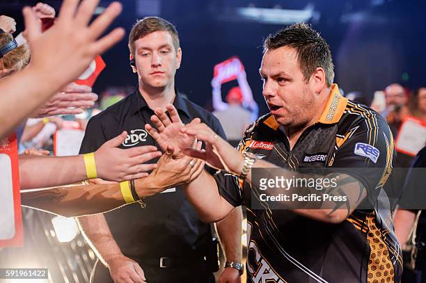 Adrian Lewis waits to walk-on to the stage for his match against Rob Szabo during the first round of the Ladbrokes Sydney Darts Masters. Adrian Lewis...