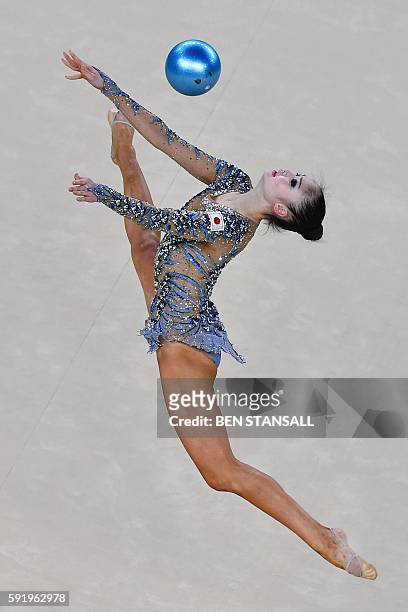 Japan's Kaho Minagawa competes in the individual all-around qualifying event of the Rhythmic Gymnastics at the Olympic Arena during the Rio 2016...
