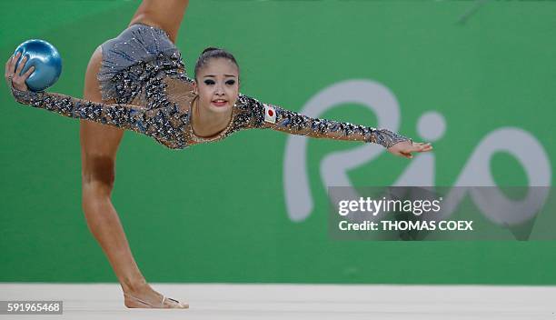 Japan's Kaho Minagawa competes in the individual all-around qualifying event of the Rhythmic Gymnastics at the Olympic Arena during the Rio 2016...