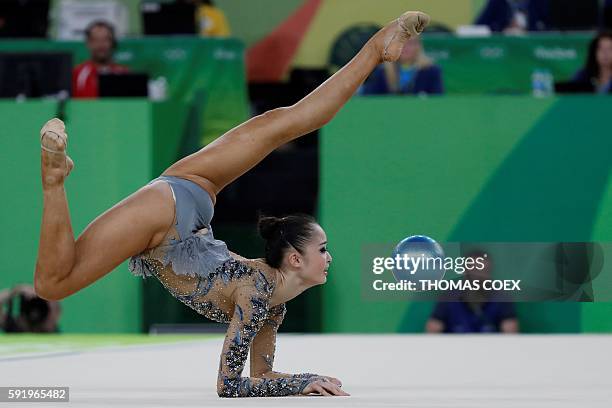 Japan's Kaho Minagawa competes in the individual all-around qualifying event of the Rhythmic Gymnastics at the Olympic Arena during the Rio 2016...