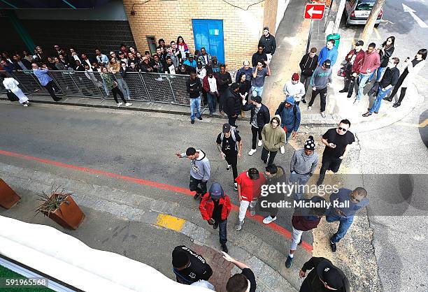 Shoppers line up outside the Kanye West temporary PABLO Store in 107 Bree Street on August 19, 2016 in Cape Town, South Africa.