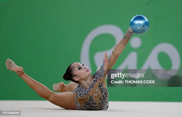 Japan's Kaho Minagawa competes in the individual all-around qualifying event of the Rhythmic Gymnastics at the Olympic Arena during the Rio 2016...