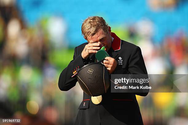 Gold medalist, Nick Skelton of Great Britain riding Big Star celerates after the Equestrian Jumping Individual Final Round on Day 14 of the Rio 2016...
