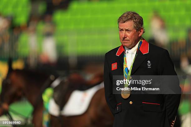 Gold medalist, Nick Skelton of Great Britain riding Big Star celerates after the Equestrian Jumping Individual Final Round on Day 14 of the Rio 2016...