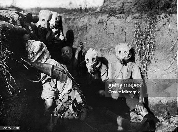 British troops of the Irish 10th Division seen here wearing gas masks in the trenches in the Struma River valley, close to Salonika. 1st August 1916