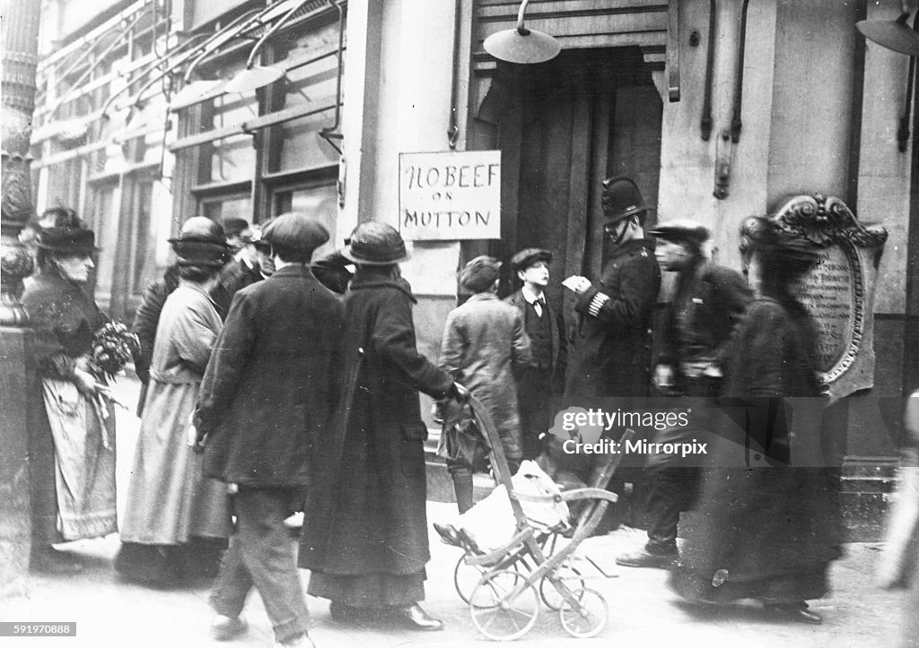 Meat Rationing A policeman check the identity papers of a young man, outside a... News ...