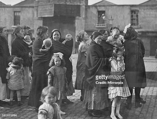 Group of Irish mothers and their babies listening to speeches from the Panel Coalition candidate in mid Dublin during the 1922 Irish elections. 13th...
