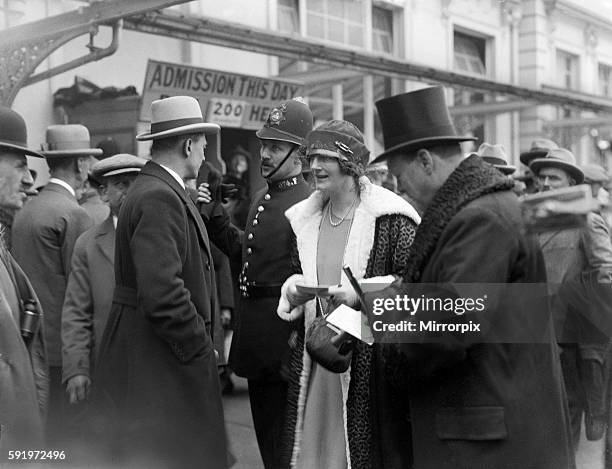 Winston Churchill is seen with his wife Clemantine Churchill at the races on Derby day at Epsom, June 1923.