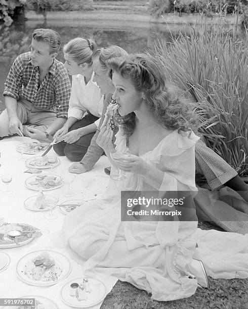 Left to right Jacques Sernas, Eric Portman, Unknown and Nadia Gray seen here at a birthday picnic party thrown by Eric Portman at Pinewood Studios....