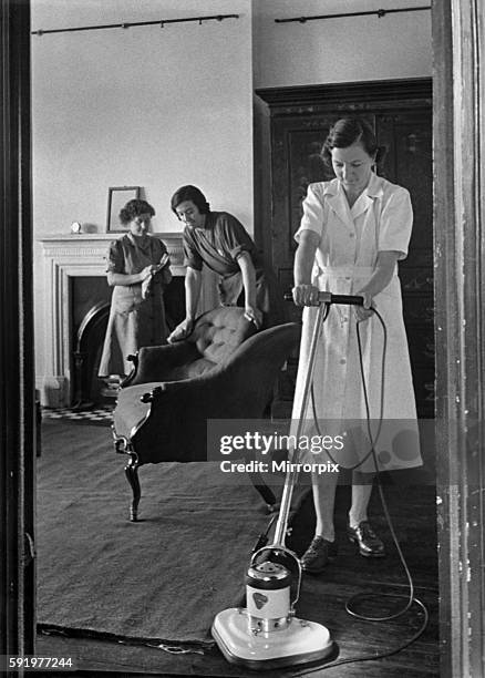 The National Institute of Houseworkers. Electric floor polisher being demonstrated. September 1947 P009134