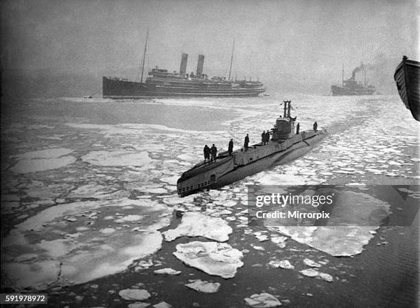 British Submarine nosing her way through East Coast ice-covered waters. The photograph was taken during the recent big freeze. June 1940 P012190