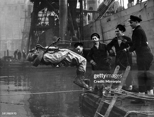 "Navy Boys" despite the job must have their fun. Here one takes a back dive in. October 1945