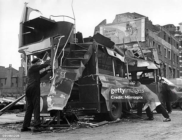 Bomb damage near Waterloo Station. A Blitzed bus caused by blast from a V1 flying bomb. June 1944 P009482