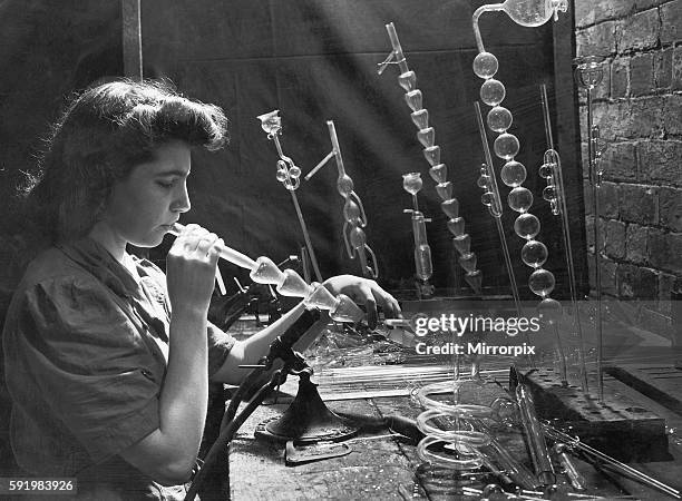 Sixteen year old Vera Mary Stone blowing glass at Prestons on West Street, Sheffield during World War Two. June 1942.