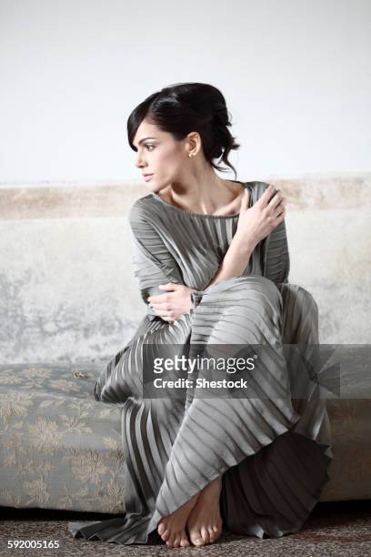 caucasian woman wearing evening gown - evening gowns stockfoto's en -beelden