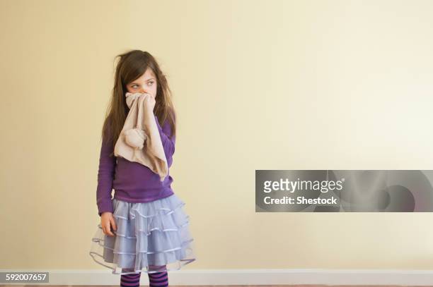 sick caucasian girl wiping nose - sad girl standing stock pictures, royalty-free photos & images