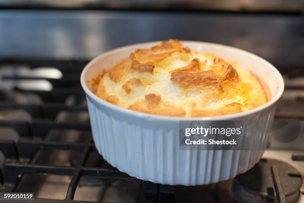 close up of baked souffle on stove - souffle stock pictures, royalty-free photos & images
