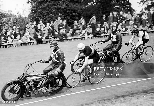 Competitors in a keirin race at Herne Hill velodrome. Polytechnic Cycling Club members on their victory lap. 18th May 1946