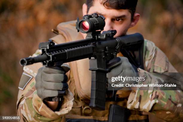 soldier aiming automatic weapon during training - winchester virginia stock pictures, royalty-free photos & images