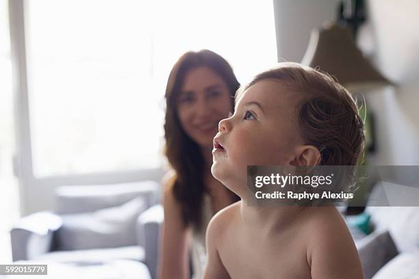 head and shoulder side view of baby boy looking up - santa clarita stock pictures, royalty-free photos & images