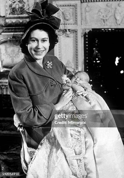 Her Majesty Queen Elizabeth II pictured when she was Princess Elizabeth with her first baby Prince Charles at Christening 1948 weby queen010306 dtgu2