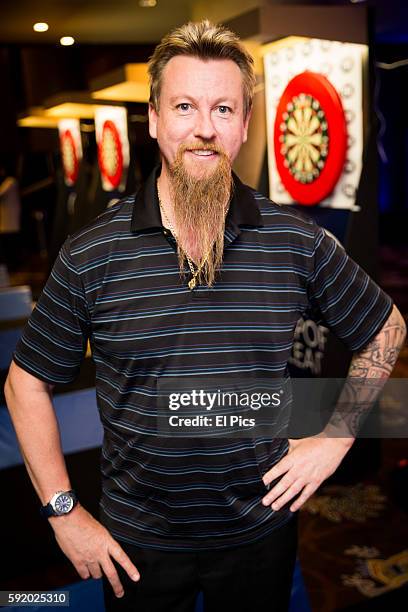 Simon Whitlock poses for a portrait during the launch of the The World Series of Darts returns to Sydney in the 2016 Ladbrokes Sydney Darts Masters...