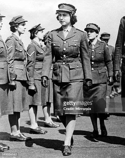 Queen Elizabeth II. Princess Elizabeth as Junior Commander in the ATS inspecting The Motor Transport Training Centre at Camberley, Surrey during the...