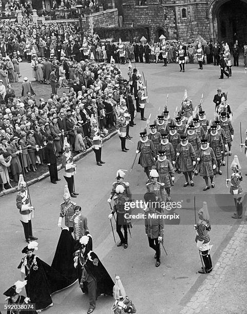 The Queen and The Duke of Edinburgh with Princess Margaret and The Queen Mother attending the installation service for the Order of the Garter at St....