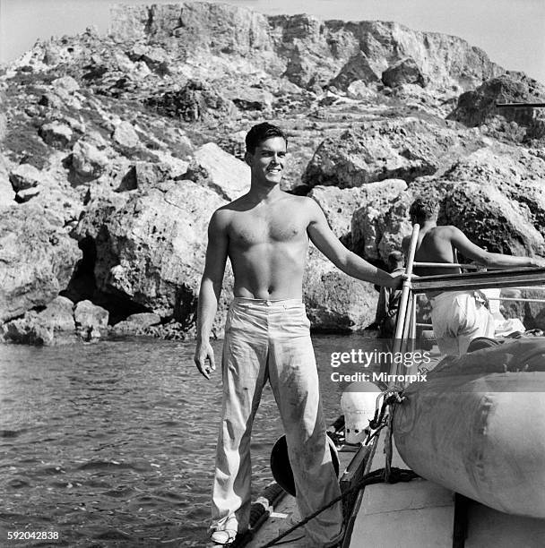 Actor Jeff Hunter on location with the Castand Crew of the film "The Malta Story". October 1952 C5351A