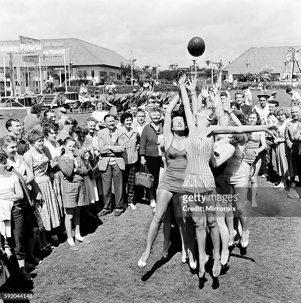 Sunday Pictorial Beach Contest at Butlins Holiday camp in Pwllheli, north Wales. Girls jumping for the ball during a lineout. 5th August 1958.