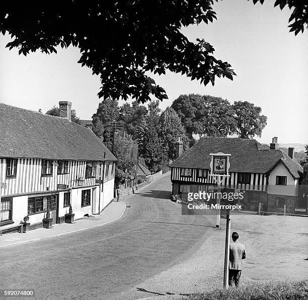 General view of the main street running though the village of Ightham near Sevenoaks in Kent, showing local shops and the pub May 1952