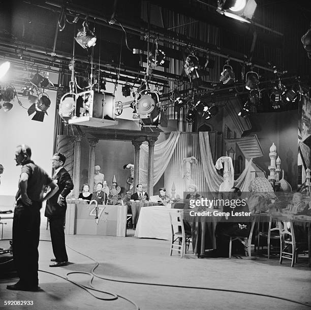 View celebrities and crew during the filming of the 27th Academy Award nominations event, Burbank, California, February 12, 1955. Among those visible...
