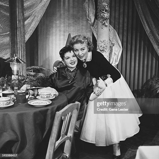 Portrait of American actresses Judy Garland and Greer Garson as they pose together at the 27th Academy Award nominations event, Burbank, California,...