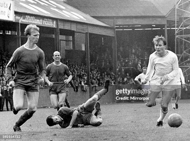 Sport - Football - Swansea City - Leeds United centre half Jack Charlton tries to head off Swansea winger Morgans as he comes through with the ball....