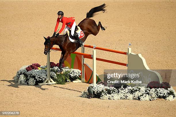 Steve Guerdat of Switzerland riding Nino Des Buissonnets competes during the Equestrian Jumping Individual Final Round on Day 14 of the Rio 2016...