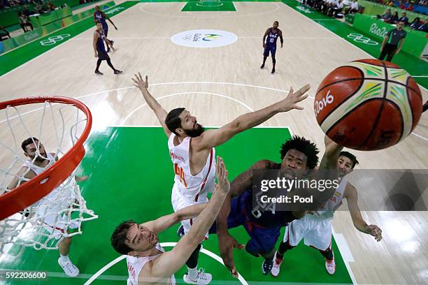 DeAndre Jordan of United States goes to the basket against Nikola Mirotic and Pau Gasol of Spain during the Men's Semifinal match on Day 14 of the...