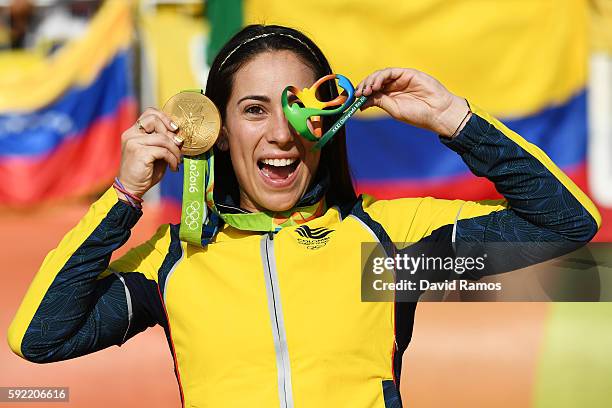 Mariana Pajon of Colombia celebrates with the gold after winning the Women's BMX Final on day 14 of the Rio 2016 Olympic Games at the Olympic BMX...