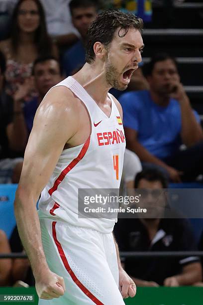 Pau Gasol of Spain celebrates a play against the United States during the Men's Semifinal match on Day 14 of the Rio 2016 Olympic Games at Carioca...