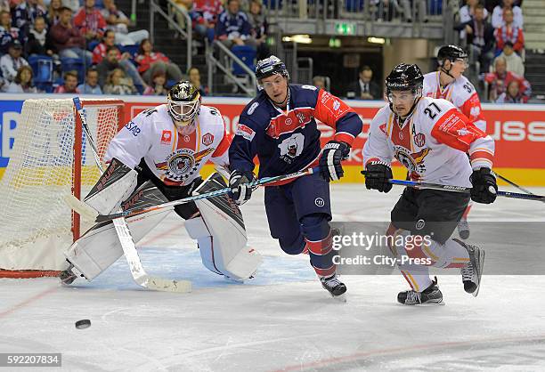 Joel Lassinantti of Lulea Hokcey, Nick Petersen of the Eisbaeren Berlin and Brendan Mikkelson of Lulea Hockey during the Champions Hockey League...