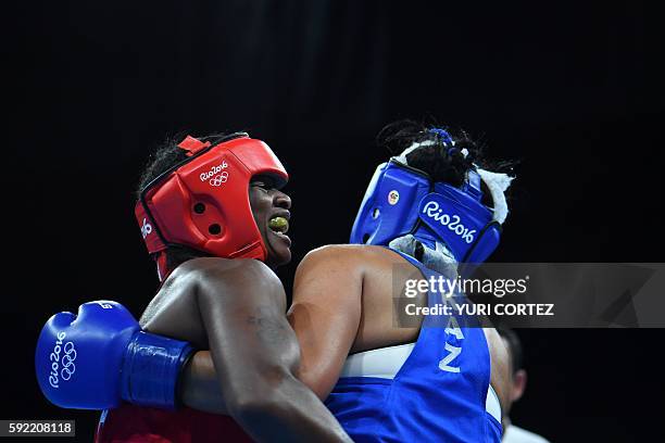 S Claressa Maria Shields fights Kazakhstan's Dariga Shakimova during the Women's Middle Semifinal 1 at the Rio 2016 Olympic Games at the Riocentro -...